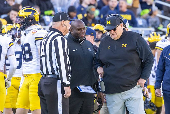 Tony Alford and Acting Head Coach Biff Poggi