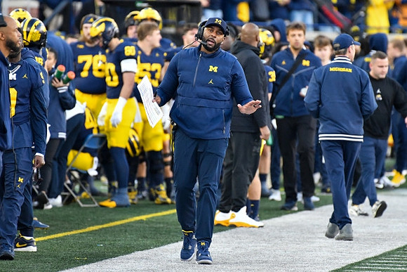 Sherrone Moore and Michigan Team