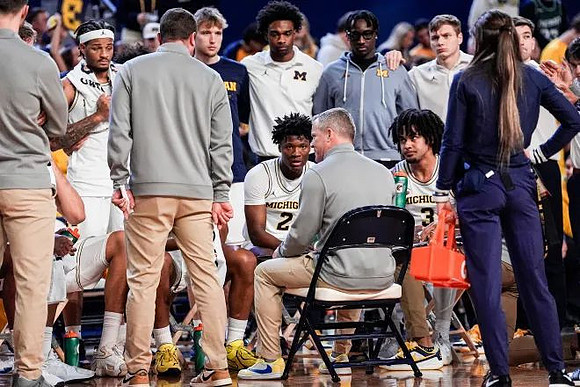Dusty May and Michigan Team
