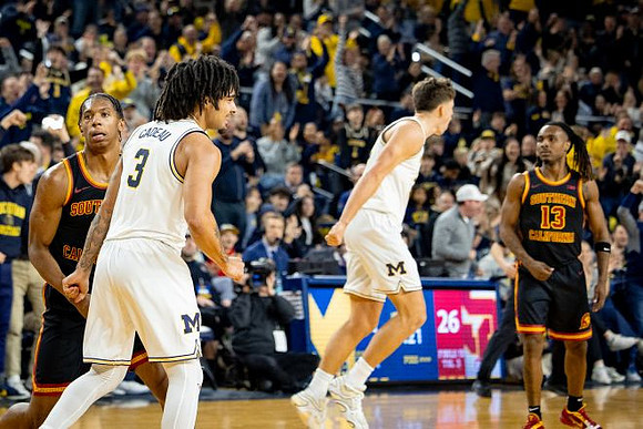 Elliot Cadeau (3) and Will Tschetter (42)