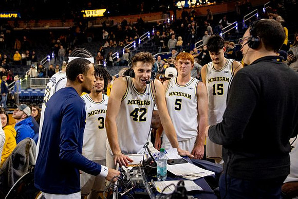 Yaxel Lendeborg (23), Elliot Cadeau (3), Will Tschetter (42), Oscar Goodman (5), Aday Mara (15), and Nimari Burnett (4)
