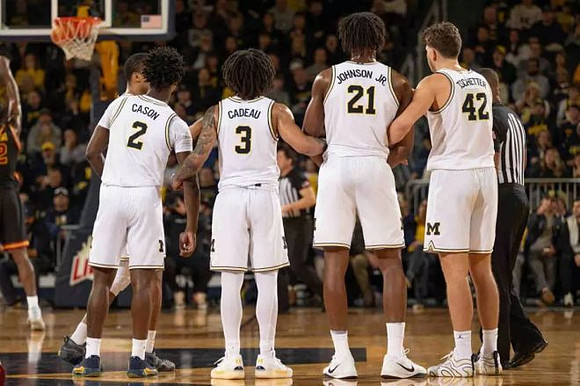 Nimari Burnett (4), L.J. Cason (2), Elliot Cadeau (3), Morez Johnson Jr. (21), and Will Tschetter (42)