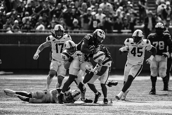 Alex Orji (10) and Myles Hinton (78)