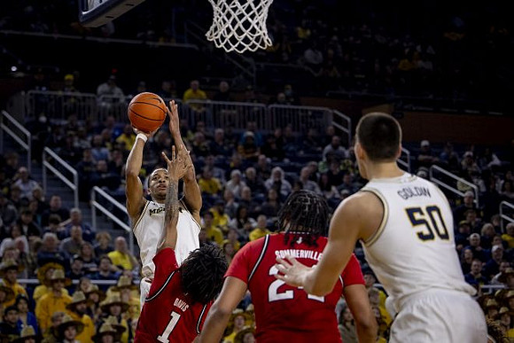 Nimari Burnett (4) and Vladislav Goldin (50)