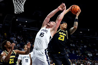 Morez Johnson Jr. (21) and Yaxel Lendeborg (23)