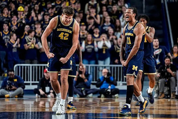 Will Tschetter (42), Roddy Gayle Jr. (11), and Morez Johnson Jr. (21)