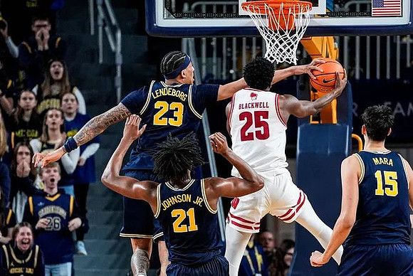 Yaxel Lendeborg (23), Morez Johnson Jr. (21), and Aday Mara (15)