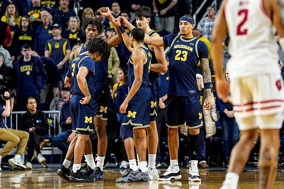 Elliot Cadeau (3), Morez Johnson Jr. (21), Nimari Burnett (4), Aday Mara (15), and Yaxel Lendeborg (23)