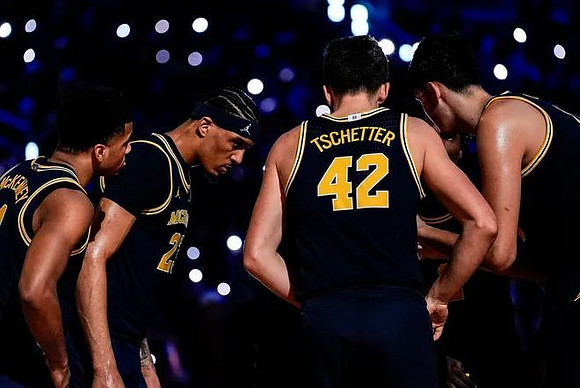 Trey McKenney (1), Yaxel Lendeborg (23), Will Tschetter (42), and Trey McKenney (1)