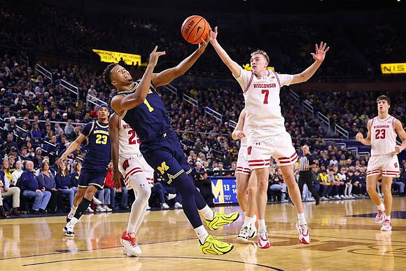 Yaxel Lendeborg (23) and Trey McKenney (1)