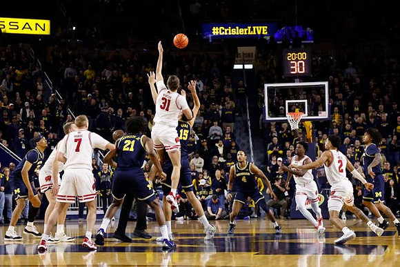 Yaxel Lendeborg (23), Morez Johnson Jr. (21), Aday Mara (15), Nimari Burnett (4), and Elliot Cadeau (3)