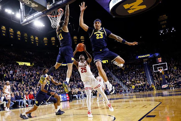 Nimari Burnett (4), Roddy Gayle Jr. (11), and Yaxel Lendeborg (23)