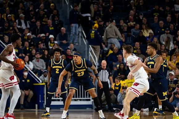 L.J. Cason (2), Yaxel Lendeborg (23), Trey McKenney (1), and Roddy Gayle Jr. (11)
