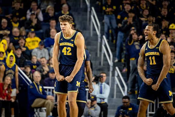 Will Tschetter (42) and Roddy Gayle Jr. (11)