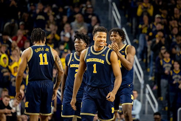 Roddy Gayle Jr. (11), L.J. Cason (2), Trey McKenney (1), and Morez Johnson Jr. (21)