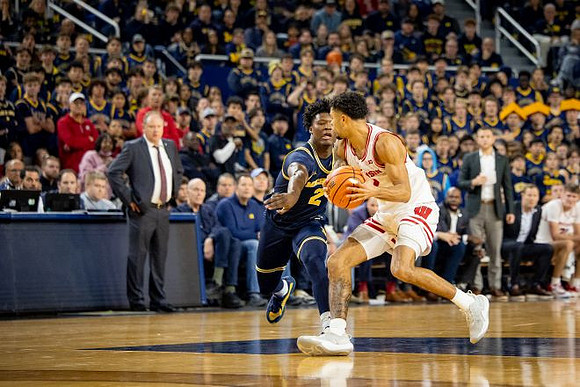 Wisconsin Head Coach Greg Gard and L.J. Cason (2)