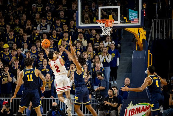 Roddy Gayle Jr. (11), Morez Johnson Jr. (21), and Nimari Burnett (4)