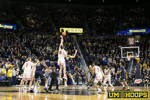 Morez Johnson Jr. (21), Aday Mara (15), Nimari Burnett (4), and Elliot Cadeau (3)