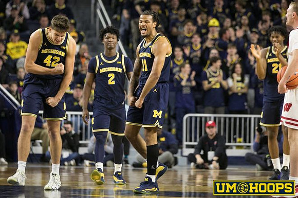 Will Tschetter (42), L.J. Cason (2), Roddy Gayle Jr. (11), and Morez Johnson Jr. (21)