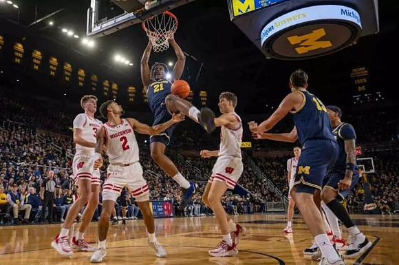 Morez Johnson Jr. (21), Aday Mara (15), and Yaxel Lendeborg (23)