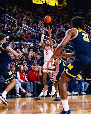 Yaxel Lendeborg (23) and Morez Johnson Jr. (21)