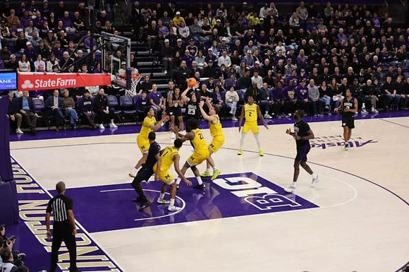 Yaxel Lendeborg (23), Trey McKenney (1), Morez Johnson Jr. (21), Will Tschetter (42), and L.J. Cason (2)