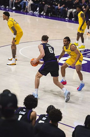 Yaxel Lendeborg (23), Roddy Gayle Jr. (11), and L.J. Cason (2)