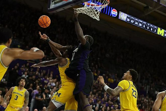 Nimari Burnett (4), Elliot Cadeau (3), Morez Johnson Jr. (21), and Yaxel Lendeborg (23)