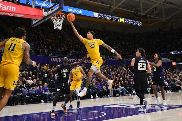 Roddy Gayle Jr. (11), Nimari Burnett (4), and Yaxel Lendeborg (23)