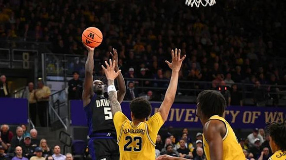 Yaxel Lendeborg (23), Morez Johnson Jr. (21), and Elliot Cadeau (3)