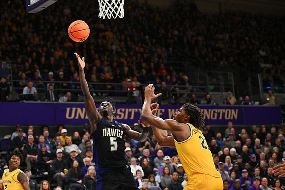 L.J. Cason (2) and Morez Johnson Jr. (21)
