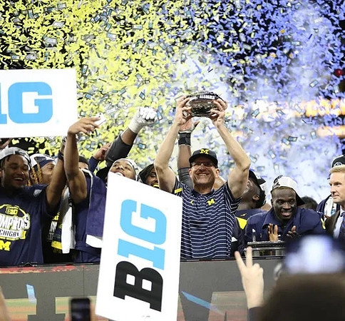 Jim Harbaugh, Michigan Team, and Big Ten Championship Trophy