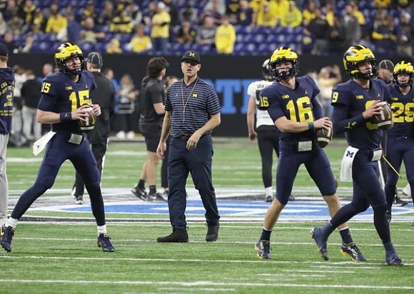 Alan Bowman (15), Jim Harbaugh, Davis Warren (16), and J.J. McCarthy (9)