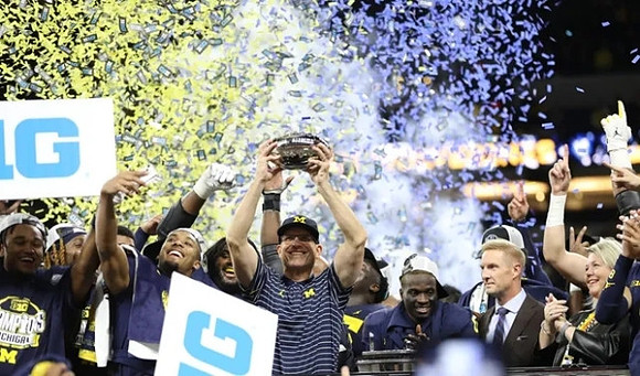 Jim Harbaugh, Michigan Team, and Big Ten Championship Trophy