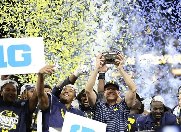 Jim Harbaugh, Michigan Team, and Big Ten Championship Trophy