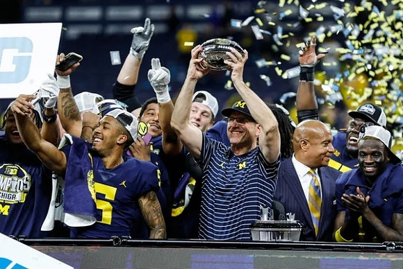 Jim Harbaugh, Michigan Team, and Big Ten Championship Trophy