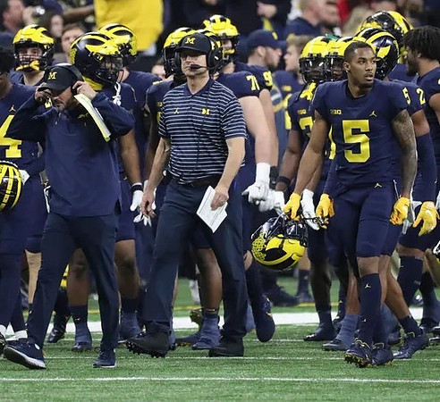 Jim Harbaugh and Michigan Team
