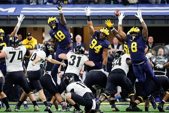 Eyabi Anoma Okie (18), Kris Jenkins (94), Mazi Smith (58), and Derrick Moore (8)