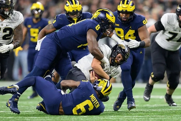 Derrick Moore (8), R.J. Moten (6), and Kris Jenkins (94)