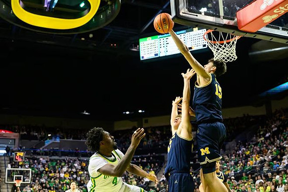 Will Tschetter (42) and Aday Mara (15)