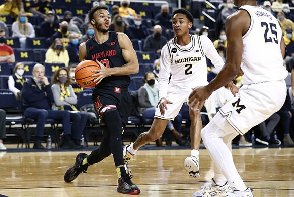 Kobe Bufkin (2) and Jace Howard (25)