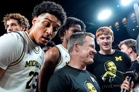 Dusty May, Yaxel Lendeborg (23), and Michigan Team