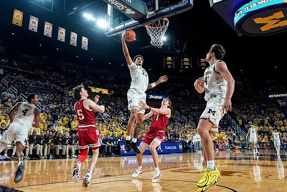 Nimari Burnett (4), Yaxel Lendeborg (23), Will Tschetter (42), Aday Mara (15), and Elliot Cadeau (3)