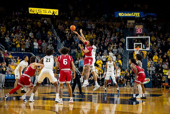 Yaxel Lendeborg (23), Morez Johnson Jr. (21), Aday Mara (15), Nimari Burnett (4), and Elliot Cadeau (3)