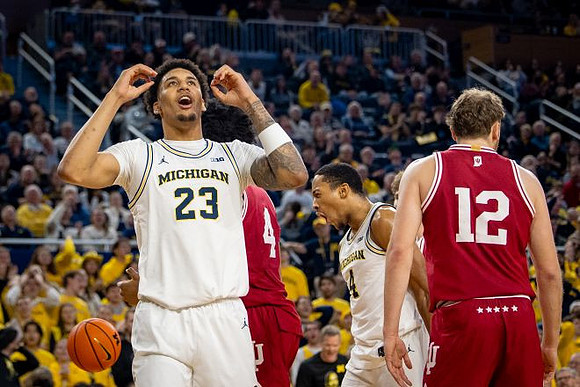 Yaxel Lendeborg (23) and Nimari Burnett (4)