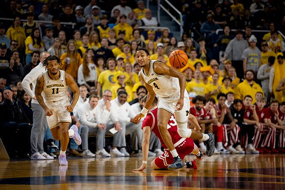 Indiana Head Coach Darian DeVries, Roddy Gayle Jr. (11), and Nimari Burnett (4)