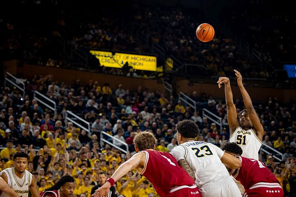 Trey McKenney (1), Yaxel Lendeborg (23), and Morez Johnson Jr. (51)