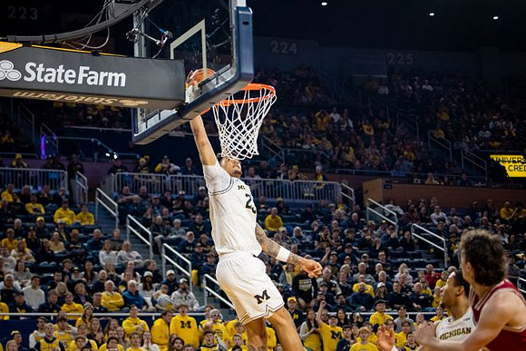 Yaxel Lendeborg (23) and Nimari Burnett (4)