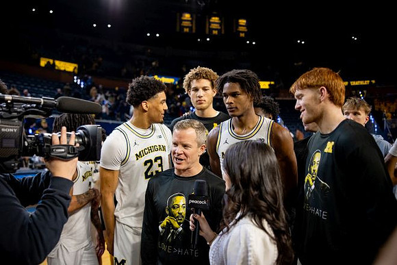 Dusty May and Michigan Team