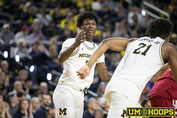 L.J. Cason (2) and Morez Johnson Jr. (21)